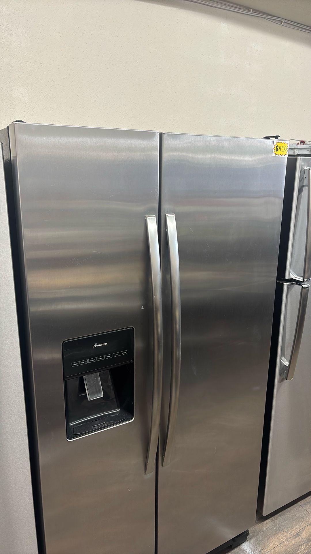 AMANA SIDE BY SIDE STAINLESS STEEL REFRIGERATOR