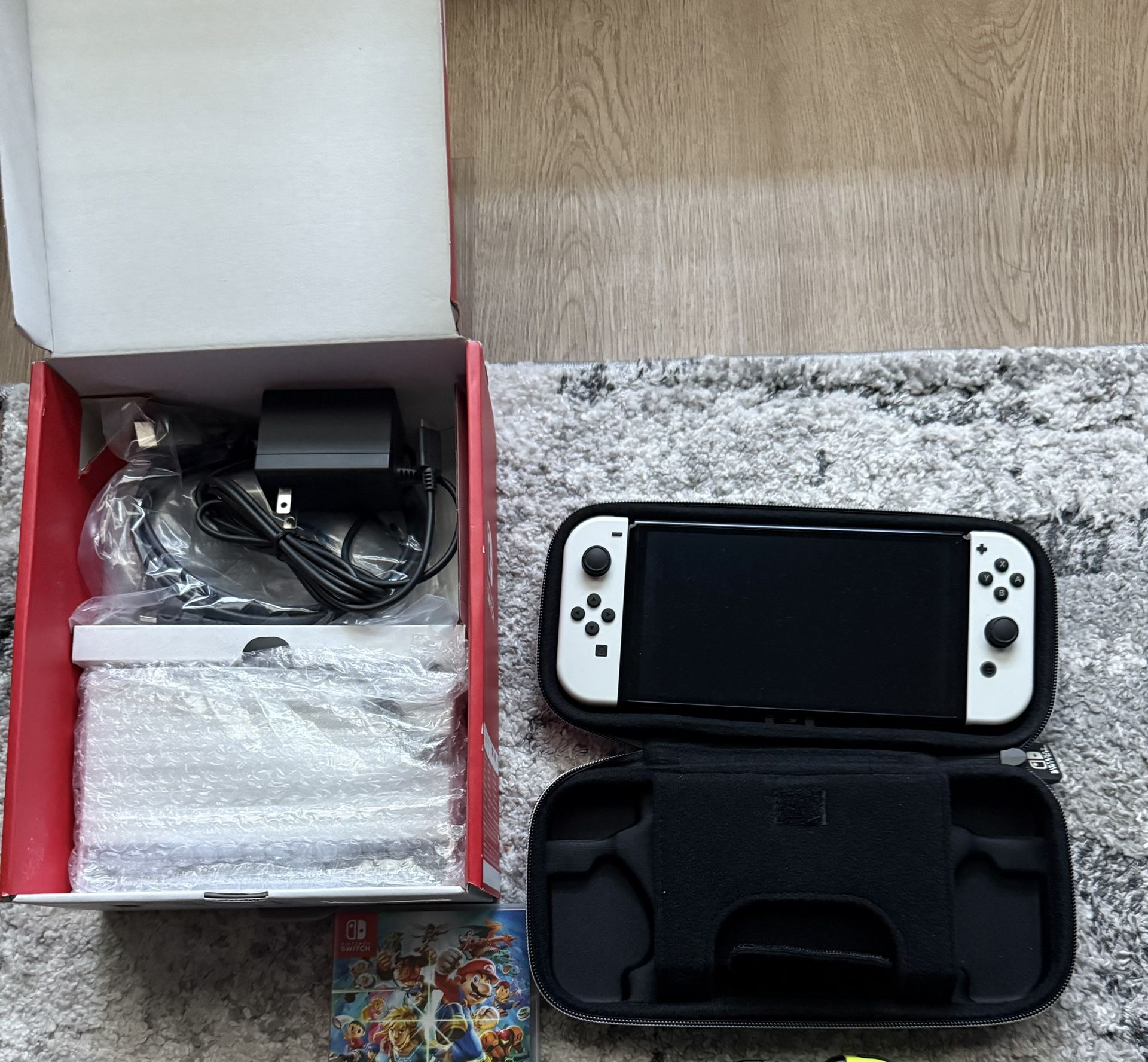 Nintendo Switch OLED with Case and Game