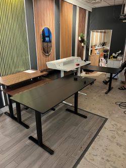 63x28 Inch Electric Standing Desk, Height Adjustable, Black Smooth Home Office Desk, 176lbs Capacity with 4 Memory Presets & Headphone Hooks. Easy to 