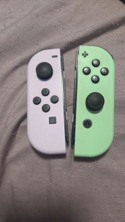 Pastel green and purple Nintendo Switch Joycons
