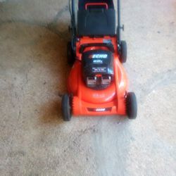 Echo Lawnmower/Charger And (3) Batterys