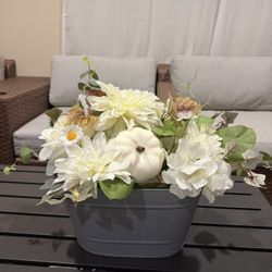 Farmhouse fall pumpkin artificial flowers planter metal basket. White brown green floral arrangement