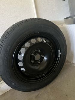 Tire with rim P215/55R16