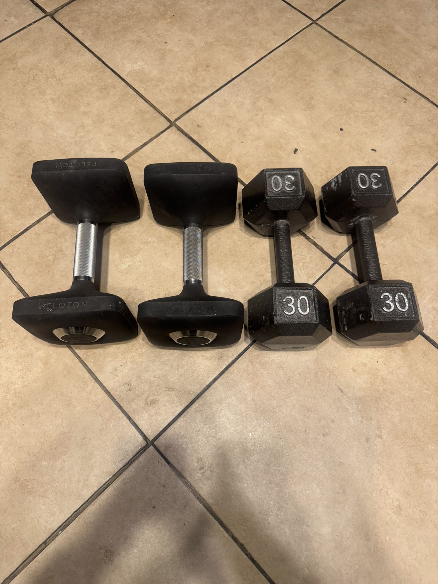 Two pairs of 30lbs dumbbells 40$ each pair Firm