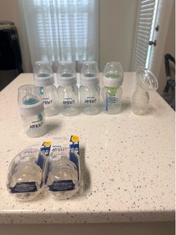 Avent Bottles and Nipples  and Hand Pump