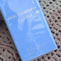 NEW & SEALED " DOLCE & GABBANA LIGHT BLUE WOMAN'S 1.7 OZ SPRAY 30$