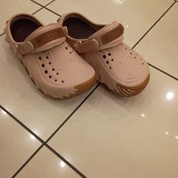 Pink and brown crocs