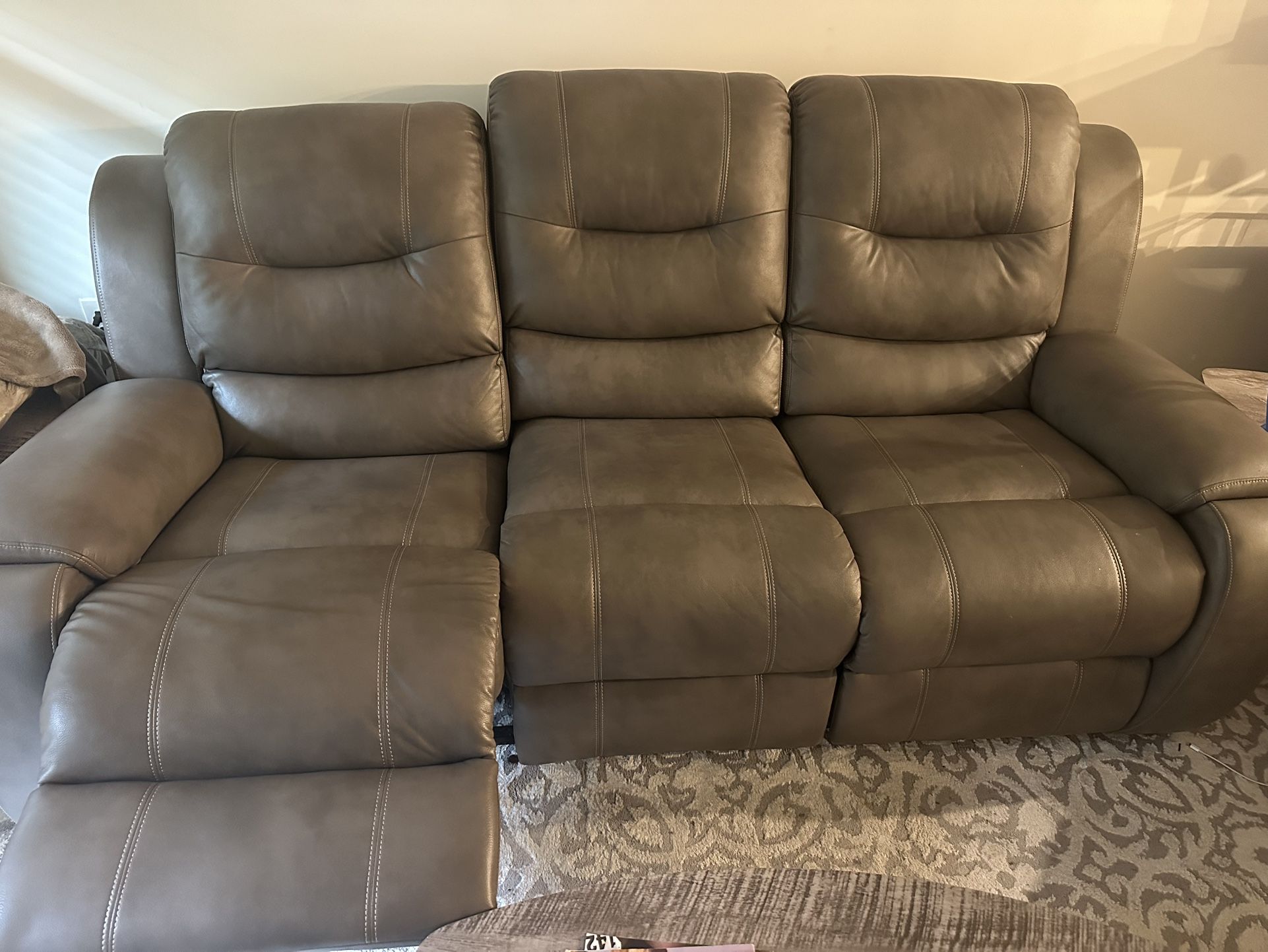 Reclining Couch With Rug