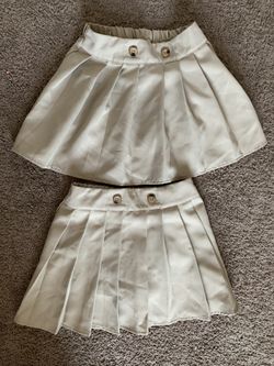 Girl skirt with shorts under. Size 6