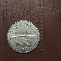 commemorative medal from the National Rifle Association (NRA) featuring the M1903 Springfield rifle. 