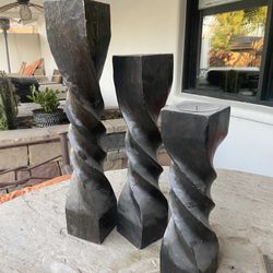 Hand carved wooden candle pillars