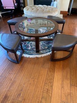 Round Glass Coffee Table with 4 Nesting Ottomans