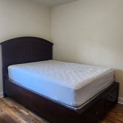 Queen Size Bed + Dresser With Mirror ( RAYMOUR AND FLANIGAN)