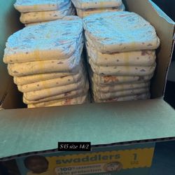 Diapers Sizes 1&2  Lots Of Them 