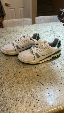 ouis Vuitton LV Trainer sneakers in white and green. 