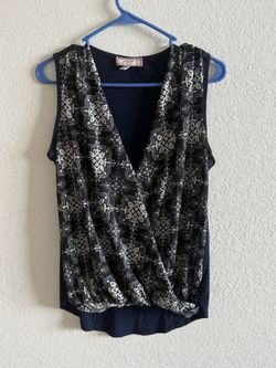 sleeveless wrap-front blouse