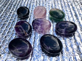 Crystals, jewelry, potion and essential oil bottles, rings, pendants