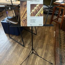 Collapsible music sheet stand, Trumpet intro Book, Trumpet cleaning tools, and A Trumpet Mute For practicing at home