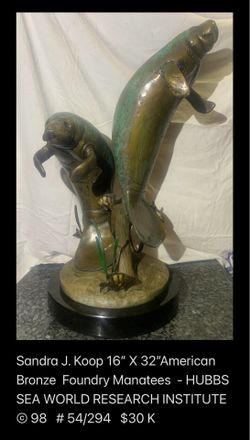 BRONZE MANATEES SCULPTURE