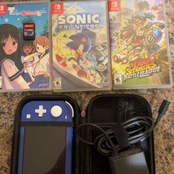 Nintendo Switch LITE with 4 games