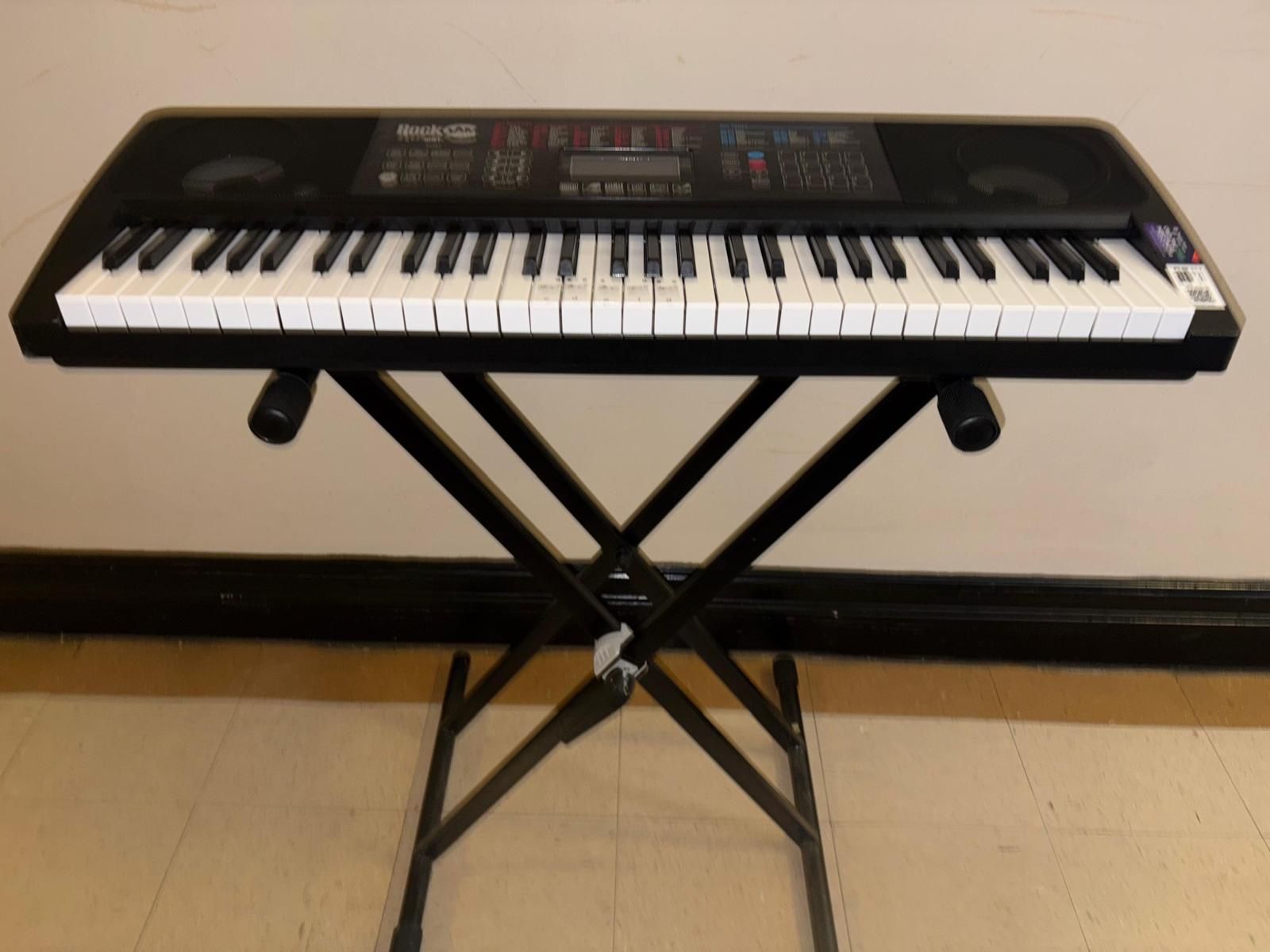 RockJam 761 61-Key Keyboard Super Kit. The keyboard has 61 full-sized keys and features a touch display panel.  It inc