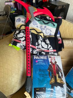 Fortnite Halloween costume with the weapon stick