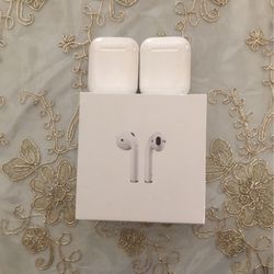 Two Apple AirPods Gen 2s
