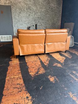 Beautiful couch needs repair or cover