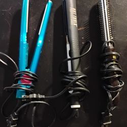 2 hair straighteners and 1 curling iron $15