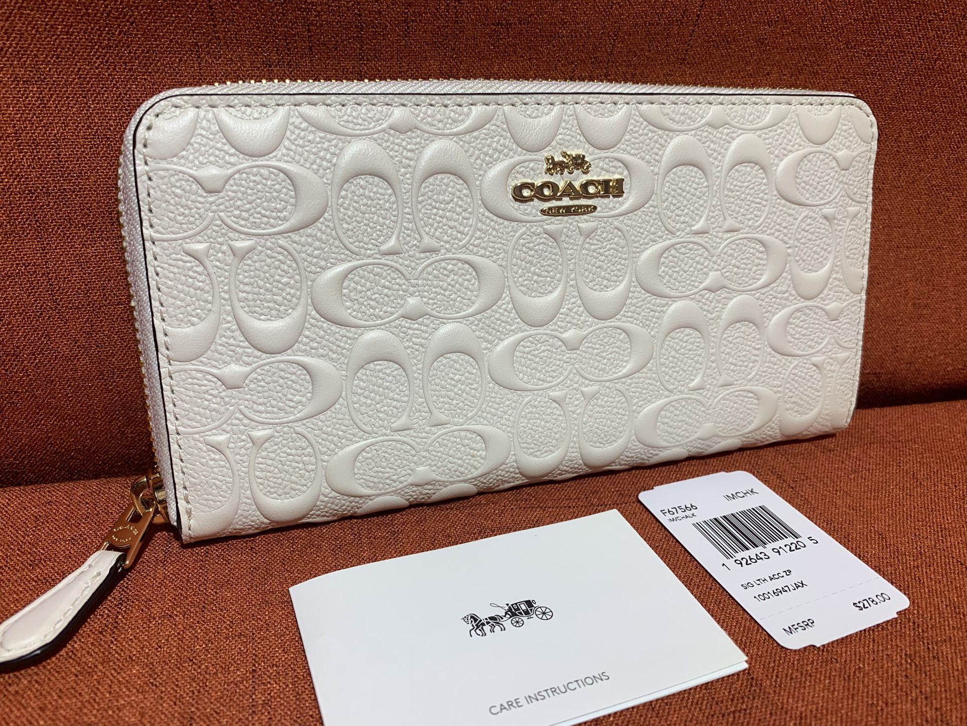Coach Accordion Zip wallet signature floral flower pink for Sale in Aloma,  FL - OfferUp