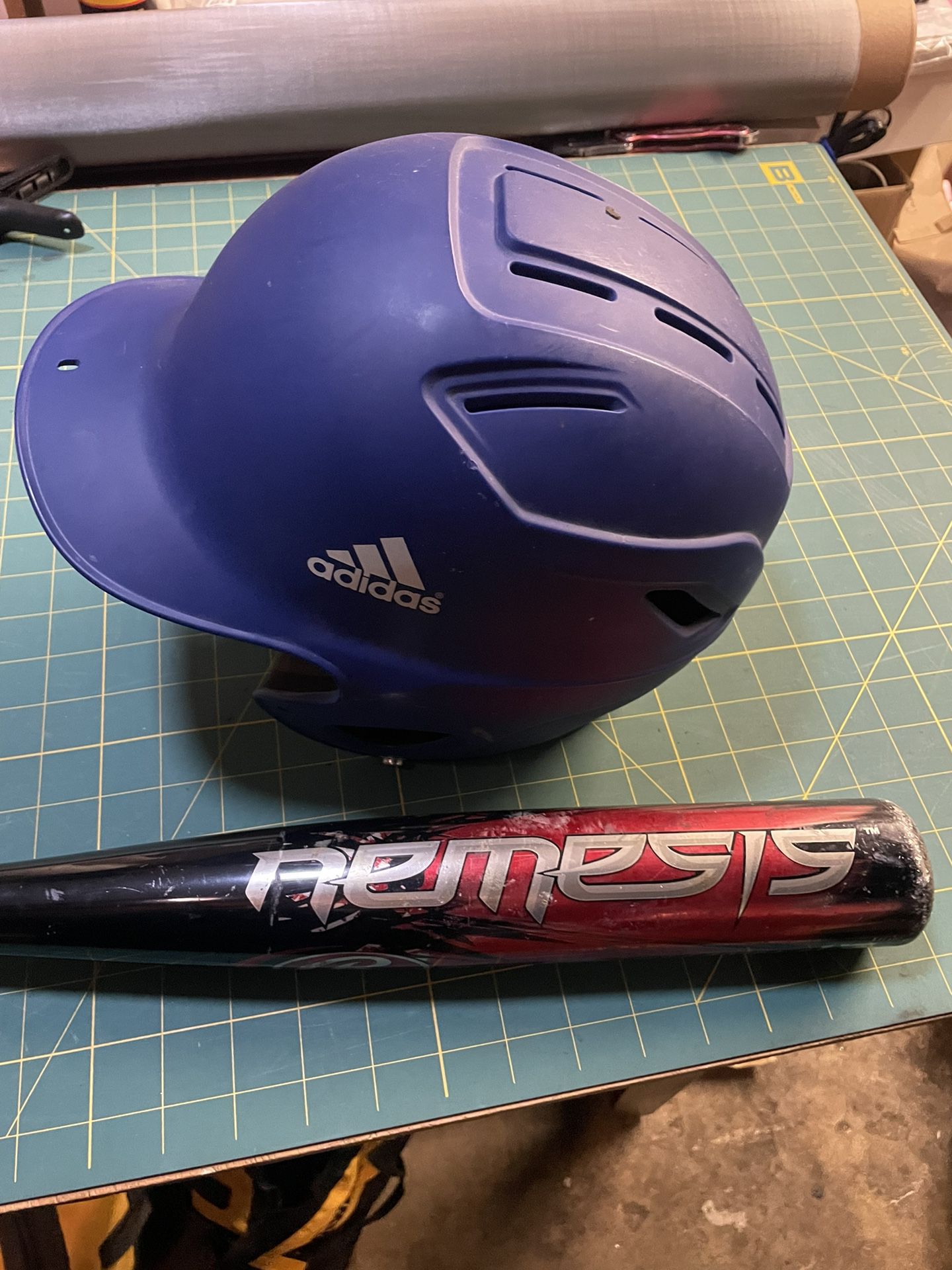 Baseball Bat And Adidas Helmet Nemesis