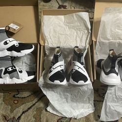 New Kids Champion Slip on Shoes $45 each. 3 Sizes: 11, 12 & 13