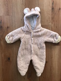 Warm and cozy teddy onesie