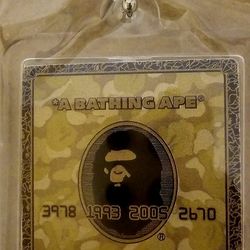 A BATHING APE KEYCHAIN (Amex Gold)