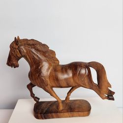 Wood hand carved horse 7 3/4" L X 6 3/4"  H . 