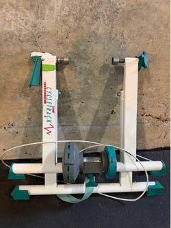 This is a Tacx Cycletrack Speedmatic indoor trainer, a vintage model designed for stationary cycling.