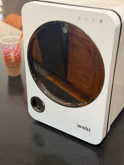 Wabi bottle sanitizer machine