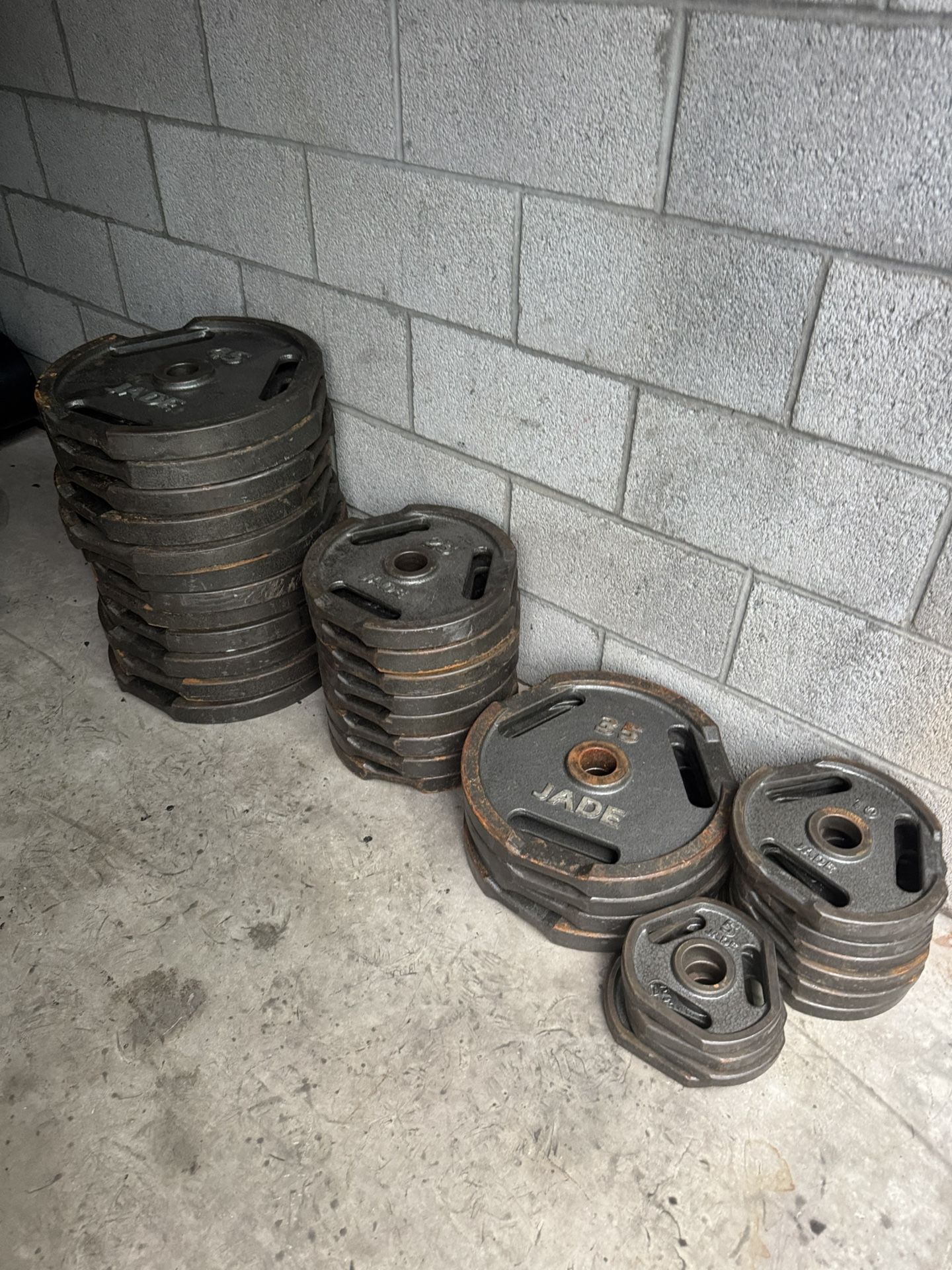 Used Olympic Grip Plates - 960 Total Lbs