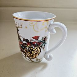Santa Claus Sleigh and Reindeer Classic Christmas White Porcelain Coffee Mug by Williams-Sonoma. Dishwasher and microwave safe. Gold rimmed edging. Pr