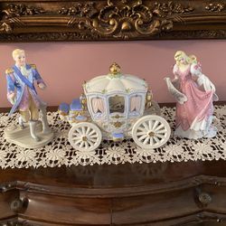 Lenox Collections “ Cinderella ,Prince Charming & Cinderella’s Enchanted  Carriage “. The sculpture Is Crafted  of fine bisque  Porcelain ,  