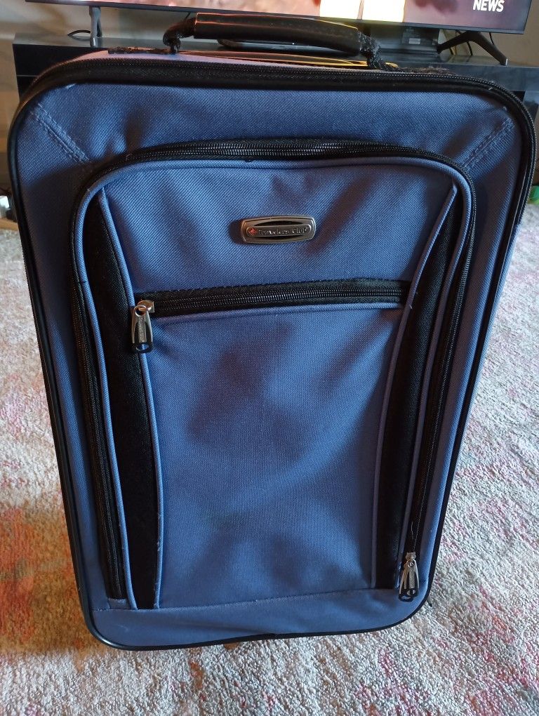Blue Travelers Club Suitcase.