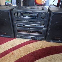 $5 DOLLAR CD AND TAPE PLAYER