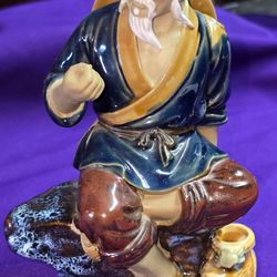 Vintage Shiwan Chinese Mudman Figurine Fishing Fisherman Mud Man 7 1/2" tall B4A104
Older pieces may have a hollow base or a finger hole inside used b