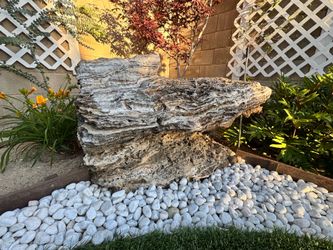 Two beautiful large natural rocks with unique layered sedimentary texture