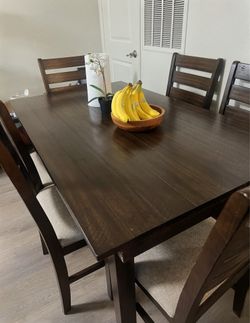 Ashley Furniture Rokane Dining Table and 6 Chairs Set - Like New