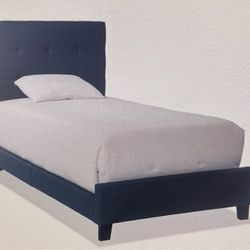 Twin bed with mattress and box spring