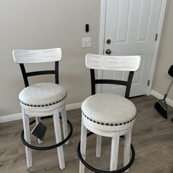 2 bar height swivel bar stools from Ashley Furniture