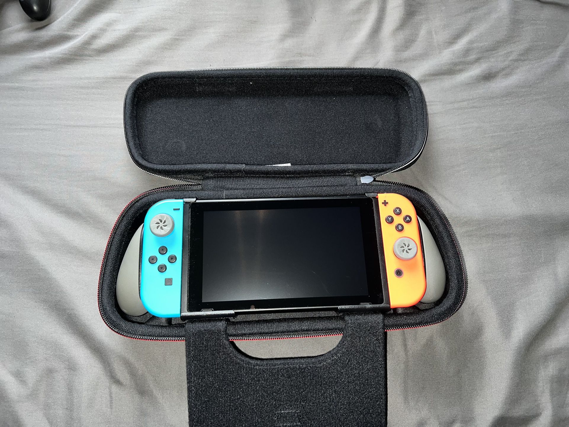 nintendo switch with accessories and charger 