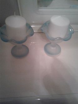 2 candle holders with candles $5
