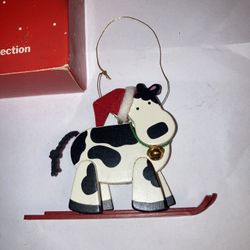 AVON Holly Jolly Skiing Cow Christmas Ornament